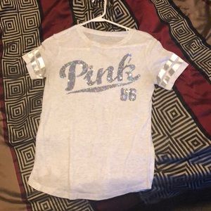 Pink T-shirt.